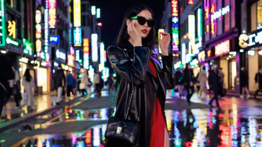 Woman wearing sunglasses in city