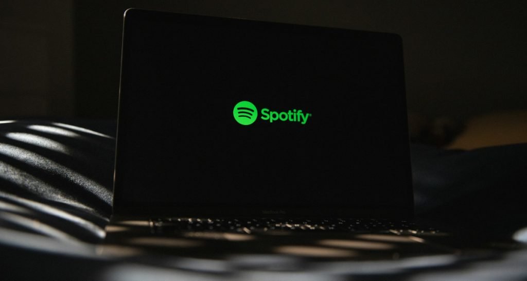 Spotify logo on laptop display