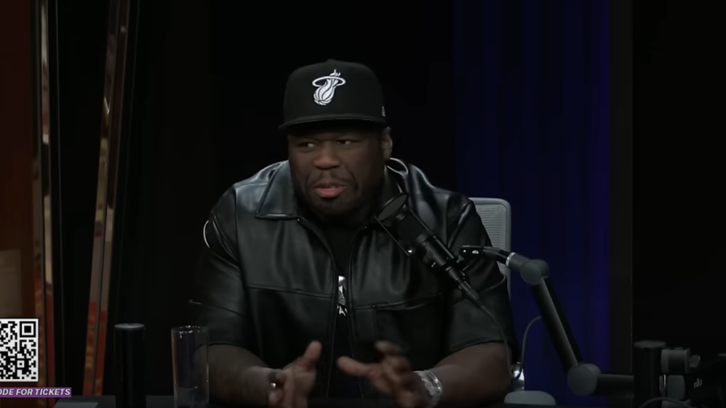 50 Cent performing with microphone