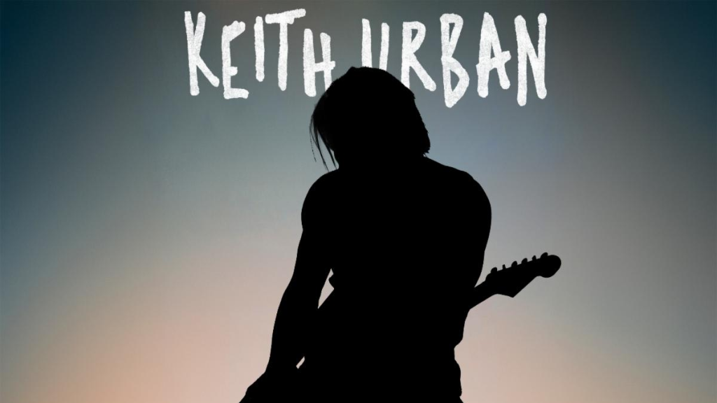 Keith Urban performing with electric guitar