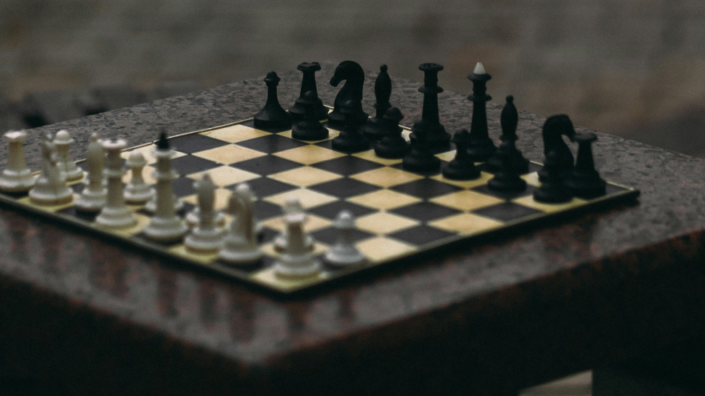 Chess game setup on wooden board