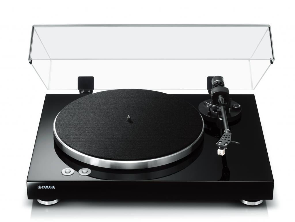 Black turntable with dust cover