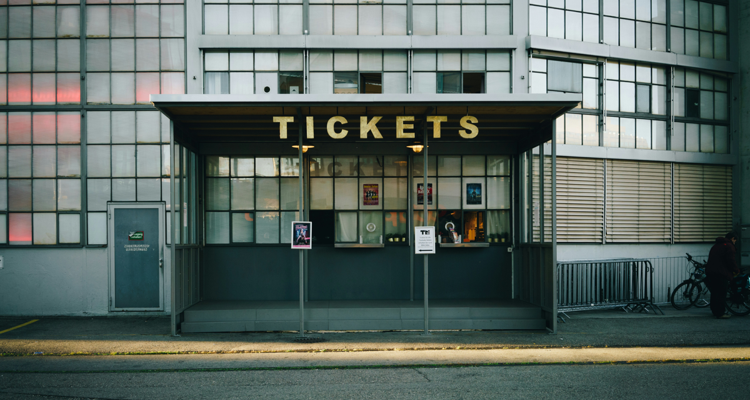 Glass office building with Ticketmaster logo