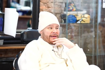 Fat Joe wearing white hat jacket