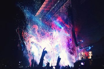 Concert crowd with falling confetti