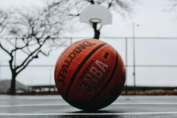 Orange basketball on outdoor court