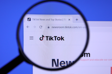 TikTok webpage with magnifying glass