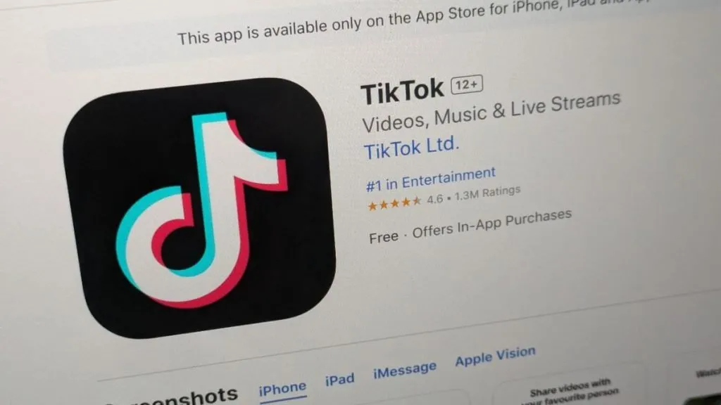 TikTok logo on device display