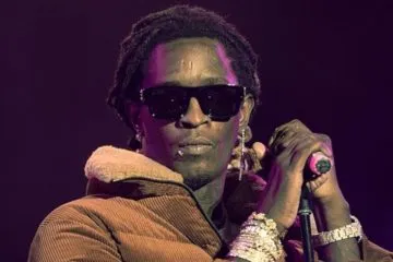 Young Thug performing with mic